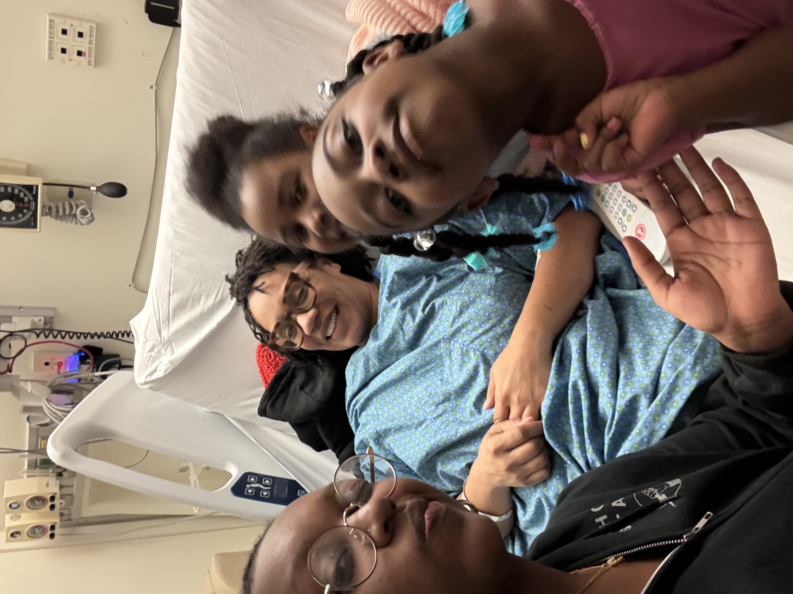 Halisi Ali El with family during hospital visit